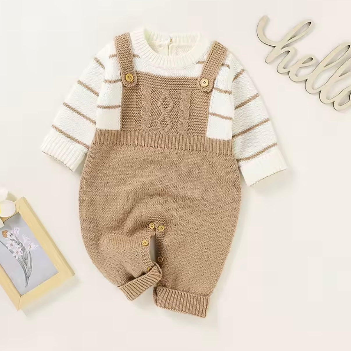 ROMPER KNITTED IN OVERALL DESIGN