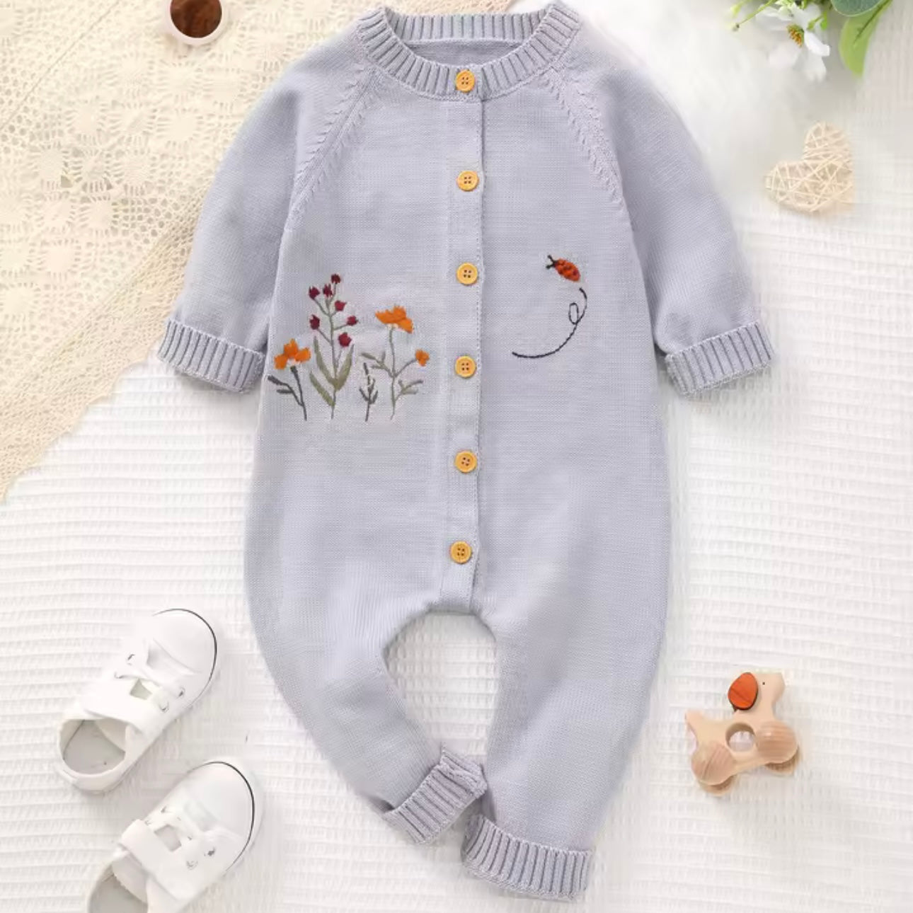 BLUE FLOWER STEM BABY GROW ROMPER