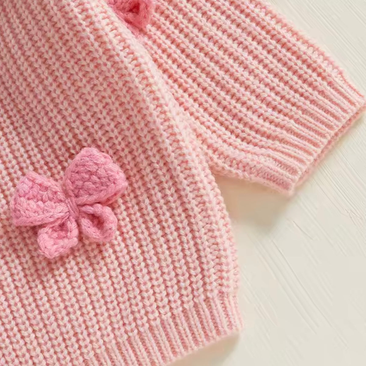 KNITTED 3D BOW JUMPER